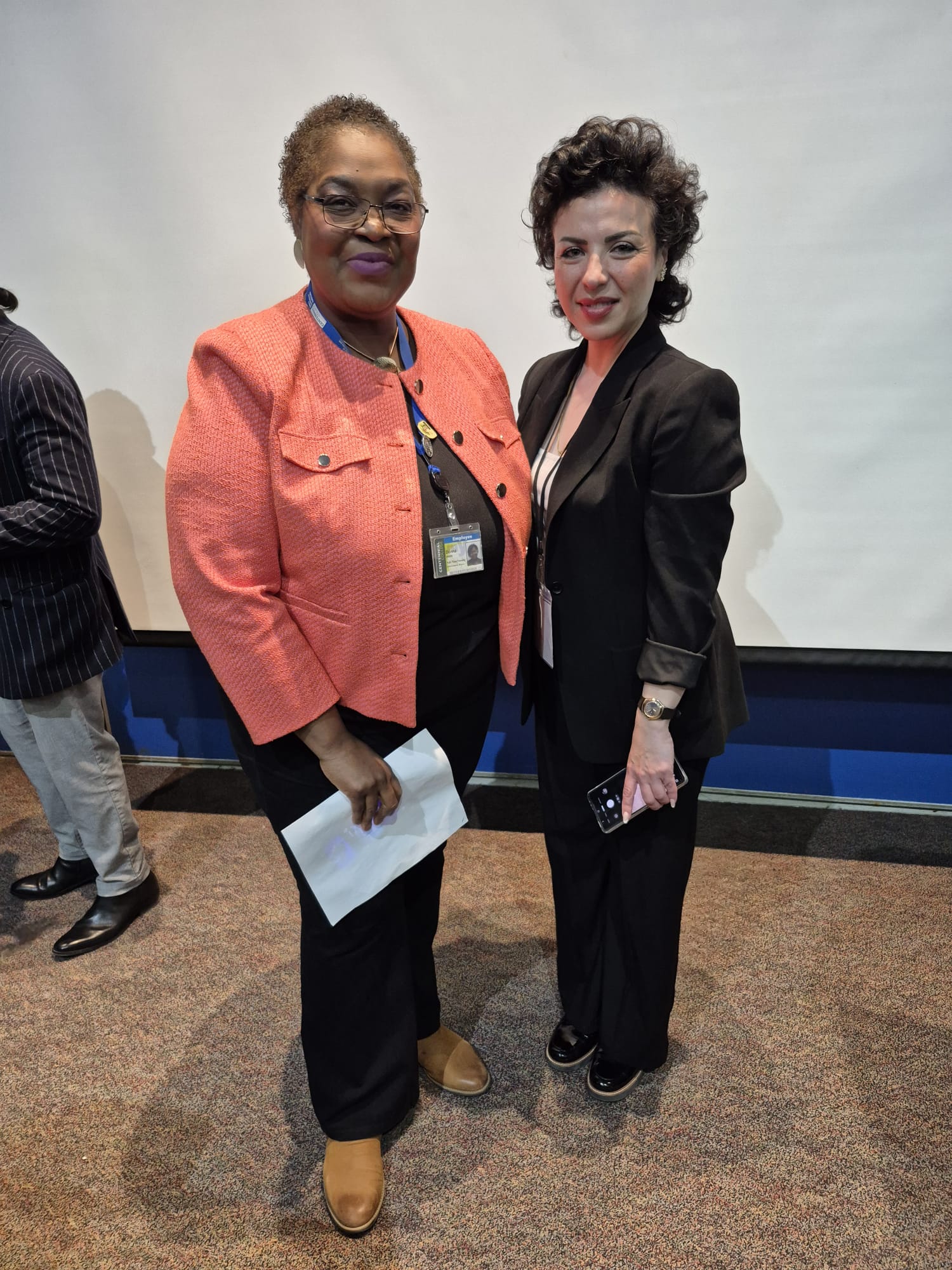 Bahareh Barahmand with a community partner at a local event